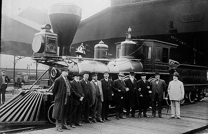 James J. Hill (center) in front of restored St. Paul and Pacific locomotive, the William Crooks (1914) James J. Hill (center) in front of restored St. Paul and Pacific locomotive, the William Crooks (1914)