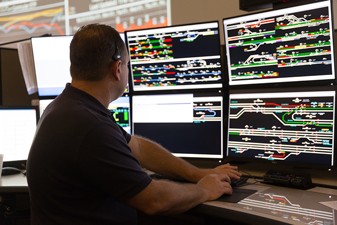 A BNSF dispatcher works in the Network Operations Center (NOC) in Fort Worth, Texas.  A BNSF dispatcher works in the Network Operations Center (NOC) in Fort Worth, Texas.