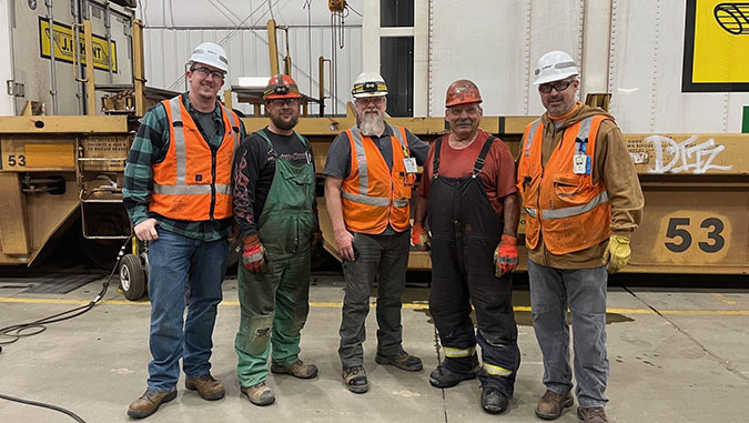 Don Eslinger with "the boys" at work. Left to right, Trainmaster Thadeus Fitchett, Carman Mike Simonson, Mechanical Foreman II Chad Vogele, Eslinger and General Foreman Justin Miller Don Eslinger with "the boys" at work. Left to right, Trainmaster Thadeus Fitchett, Carman Mike Simonson, Mechanical Foreman II Chad Vogele, Eslinger and General Foreman Justin Miller