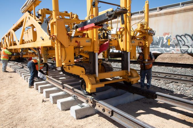 Men working on equiptment. Men working on equiptment.