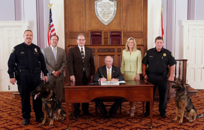 Railroad Police K-9 Protection Bill signing by Alabama Governor Robert Bentley. BNSF Senior Special Agent Bryan Schaffer and Faust are at left.  Railroad Police K-9 Protection Bill signing by Alabama Governor Robert Bentley. BNSF Senior Special Agent Bryan Schaffer and Faust are at left.
