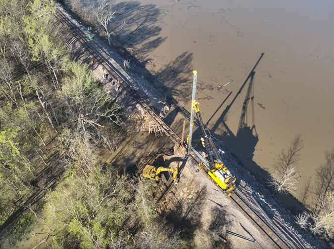 Crews work to replace the washed-out culvert with a bridge.  Crews work to replace the washed-out culvert with a bridge.