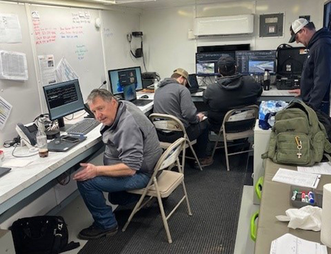BNSF team members coordinate the response from a mobile command center. BNSF team members coordinate the response from a mobile command center.