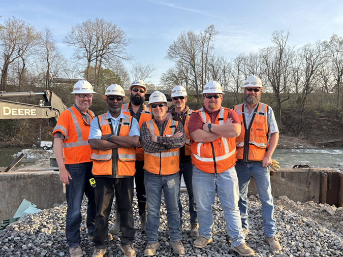 Some of our Structures team members: AVP of Engineering Services & Structures Craig Rasmussen, Structures Engineer Kris Harris, Assistant Director of Bridge Maintenance Dave Mordy, General Director of Structures Ron Berry, Director of Bridge Maintenance Austin Hurst, Assistant Supervisor of Structures John Weyrauch, and Assistant Director of Bridge Maintenance Kit Clark. Some of our Structures team members: AVP of Engineering Services & Structures Craig Rasmussen, Structures Engineer Kris Harris, Assistant Director of Bridge Maintenance Dave Mordy, General Director of Structures Ron Berry, Director of Bridge Maintenance Austin Hurst, Assistant Supervisor of Structures John Weyrauch, and Assistant Director of Bridge Maintenance Kit Clark.