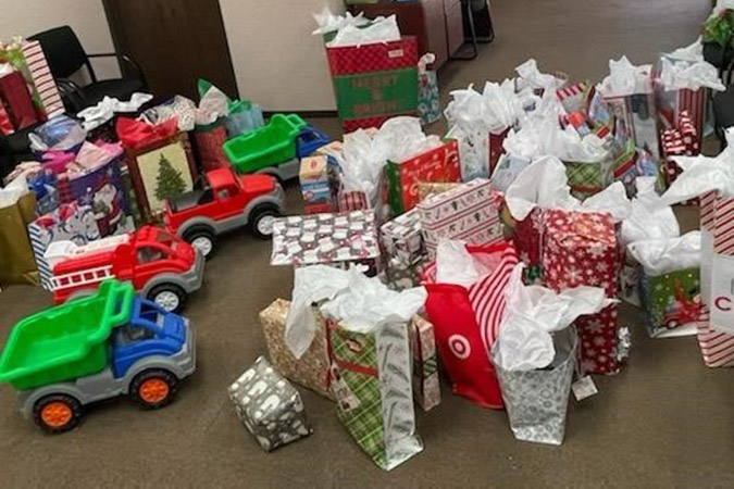 The collection of gifts for 50 children in foster care homes provided by BNSF employees. The collection of gifts for 50 children in foster care homes provided by BNSF employees.