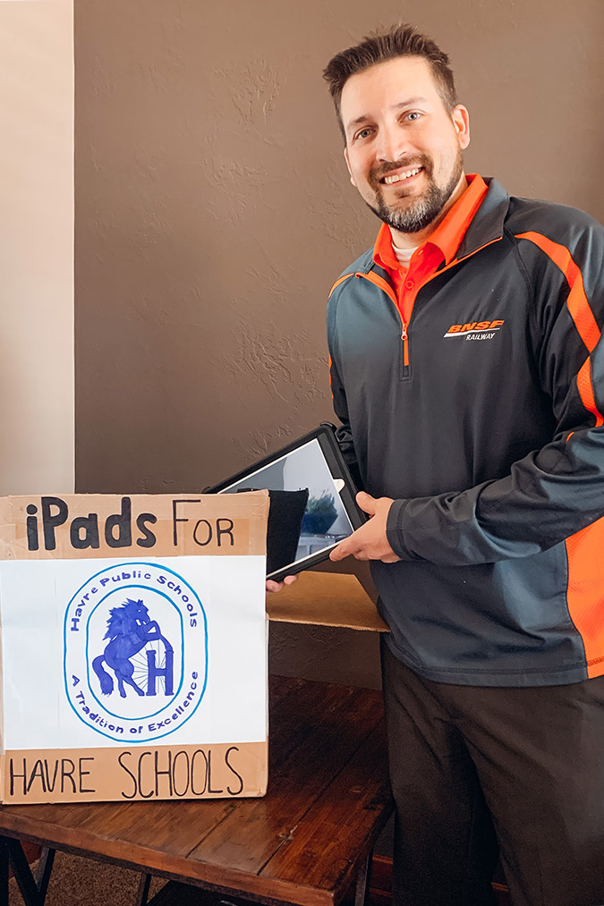 BNSF Havre, Mont., Superintendent Field Ops Shawn Ball boxes iPads for donation to area students.  BNSF Havre, Mont., Superintendent Field Ops Shawn Ball boxes iPads for donation to area students.