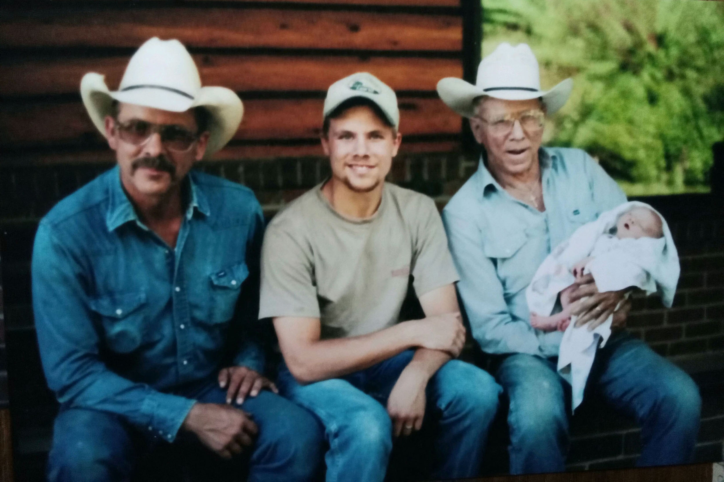 From left to right: Greg Hampson, Ben Hampson and Bill Hampson holding Ben’s son, Thad From left to right: Greg Hampson, Ben Hampson and Bill Hampson holding Ben’s son, Thad