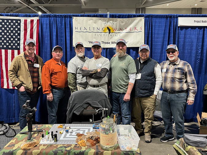 Daprato, center, and other members of the Healing Waters group from Topeka  Daprato, center, and other members of the Healing Waters group from Topeka