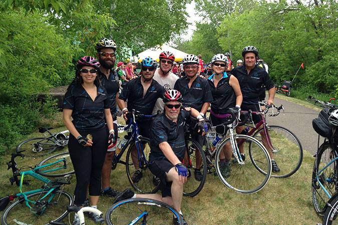 Fisher with other railroaders at the MS150 cycling ride. From left -- Maria Morgan, Jonathan Morgan, Fisher, Roger McGowan, Tu Tran, Carla Jacobson, Phil Peters, and in the Front Mark Duell  Fisher with other railroaders at the MS150 cycling ride. From left -- Maria Morgan, Jonathan Morgan, Fisher, Roger McGowan, Tu Tran, Carla Jacobson, Phil Peters, and in the Front Mark Duell