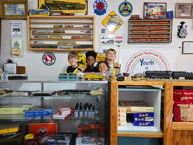 Daecian with his friends and sister Kate at the Youth in Model Railroading store  Daecian with his friends and sister Kate at the Youth in Model Railroading store