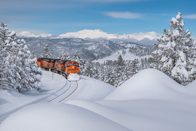 BNSF train passing through a snowy landscape in Colorado. Photo by Erik Lindgren.  BNSF train passing through a snowy landscape in Colorado. Photo by Erik Lindgren.