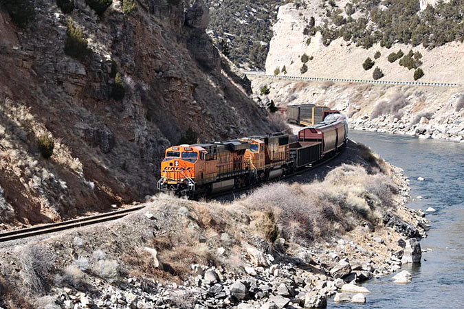 BNSF train passing through Wind River Canyon, Wyoming BNSF train passing through Wind River Canyon, Wyoming