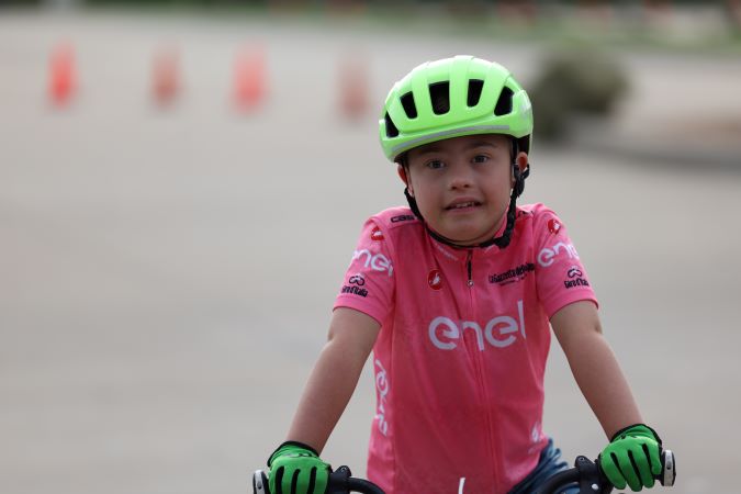 A Special Olympics athlete competing at the cycling event.  A Special Olympics athlete competing at the cycling event.