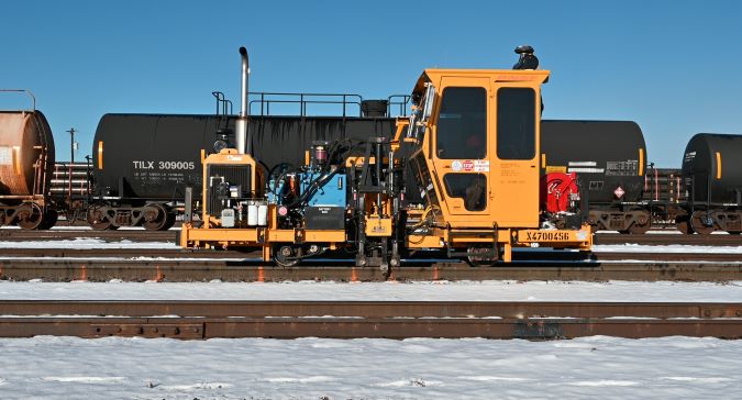 The spike puller at work.  The spike puller at work.