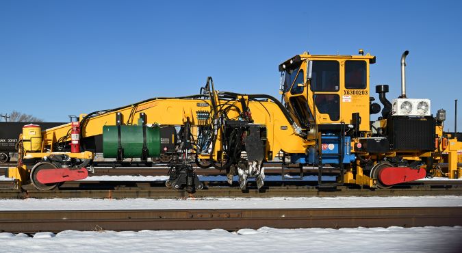 The Tripp machine slides out the ties.  The Tripp machine slides out the ties.