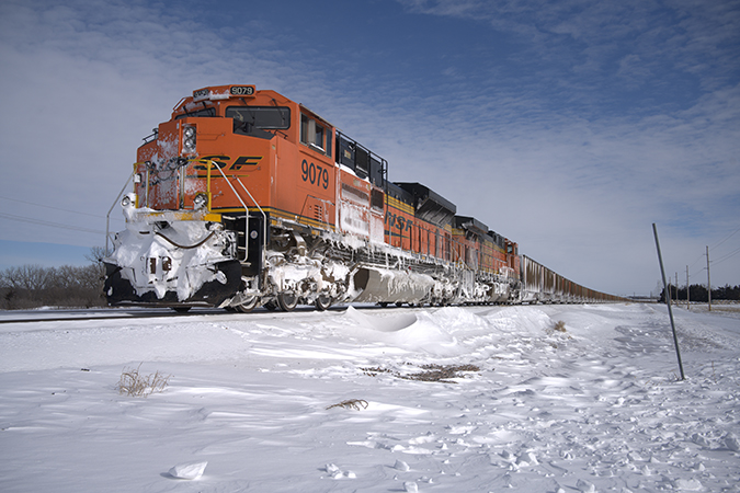 A coal train near Seward, Nebraska, waits for tracks ahead to be cleared. A coal train near Seward, Nebraska, waits for tracks ahead to be cleared.