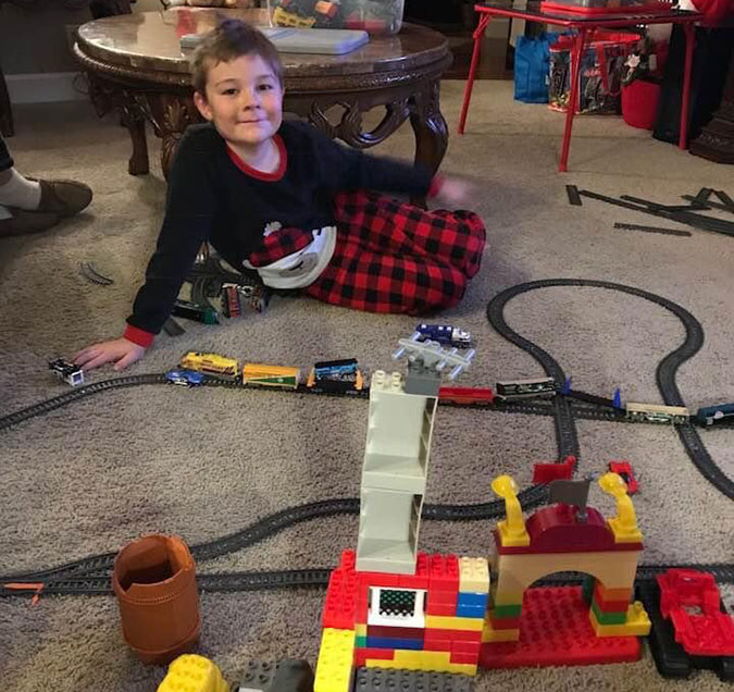 Alexander and his Lego trainset Alexander and his Lego trainset